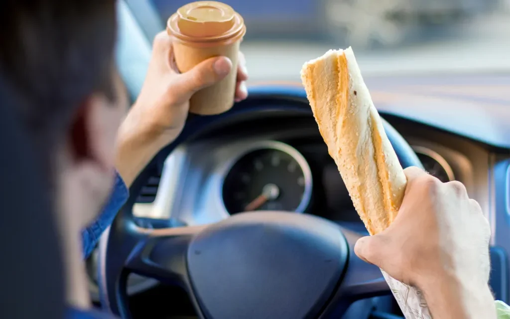 10 Common types of distracted car accidents in Georgia 1 10-common-types-of-distracted-car-accidents-in-Georgia-eating-and-driving